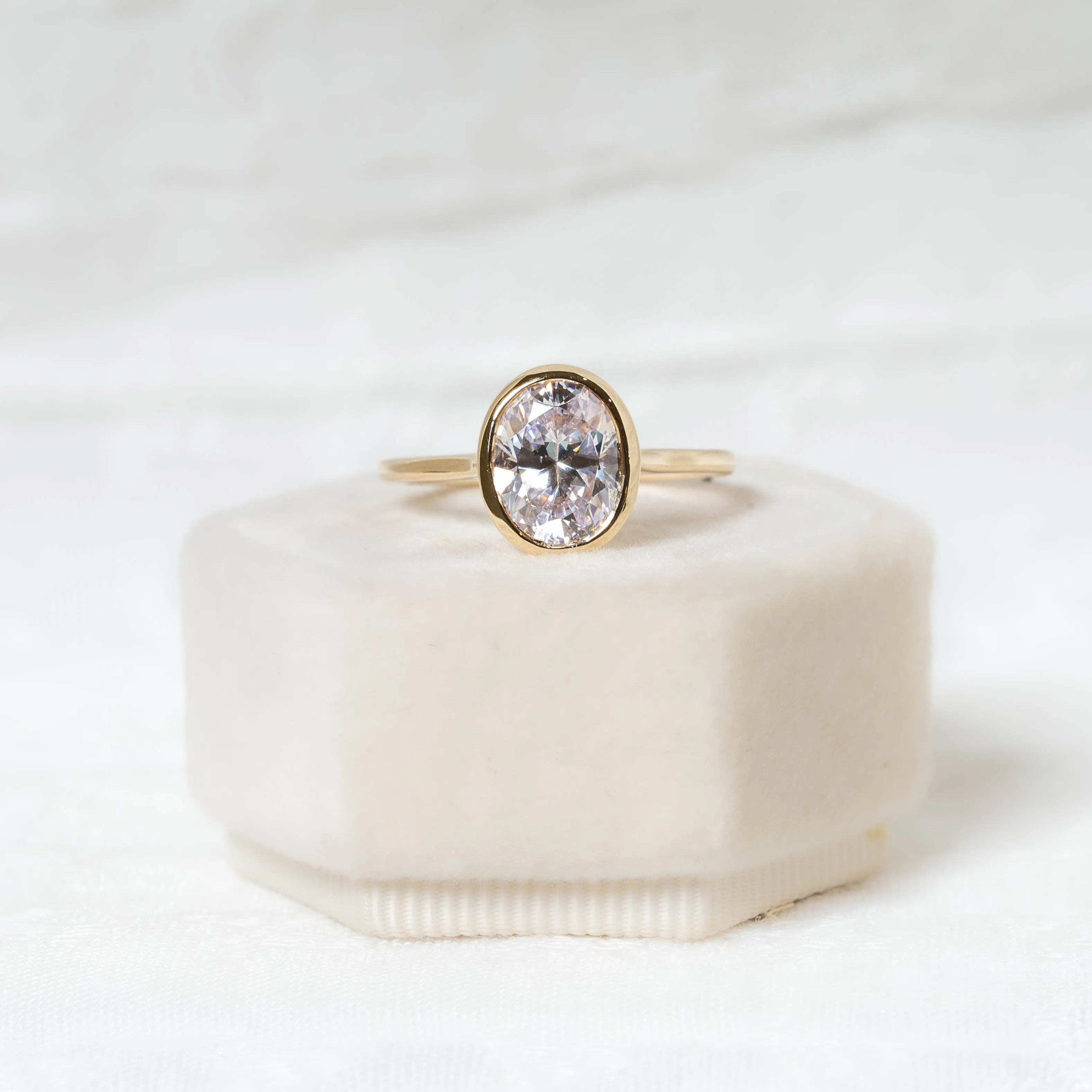 14ky Oval Bezel Cathedral Diamond Ring