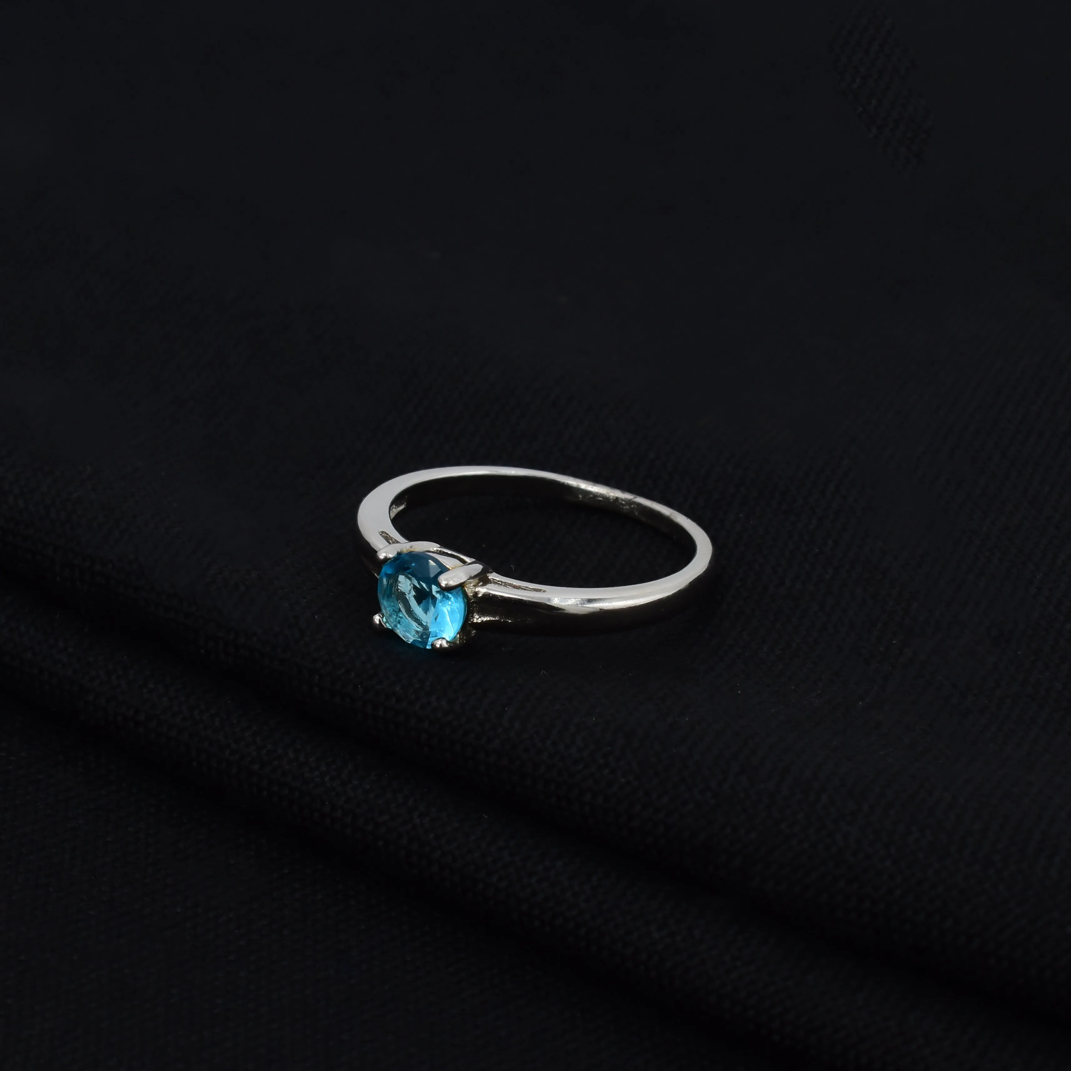 Blue Topaz Round Shaped Sterling Silver Ring