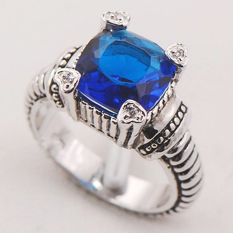 Four Hearts on Sapphire Blue CZ Ring - 925 Sterling Silver