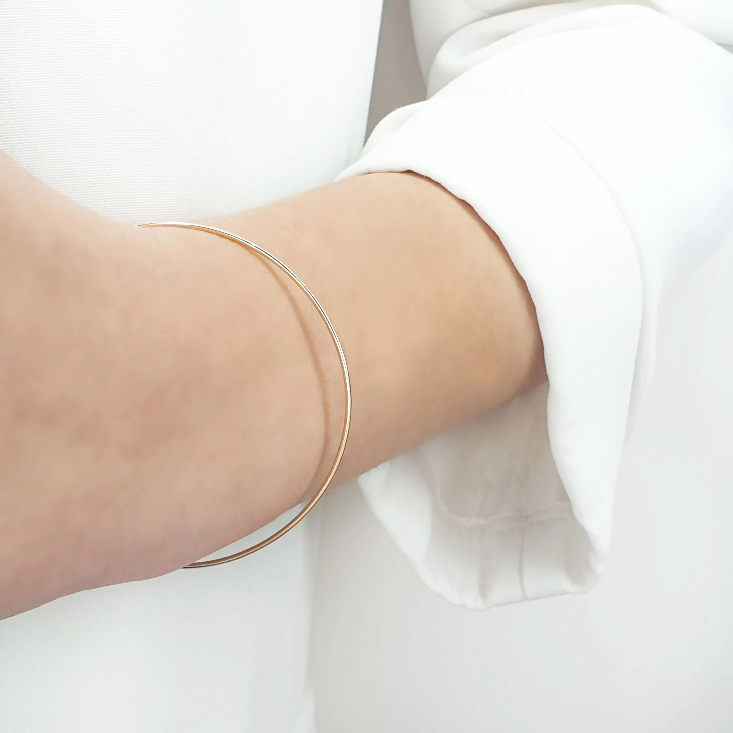 Thin gold bangle