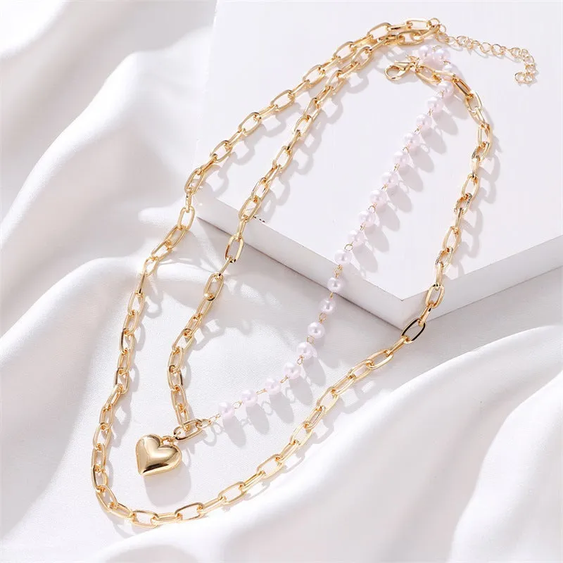 XN018 - Simple multi-layer pearl chain heart pendant